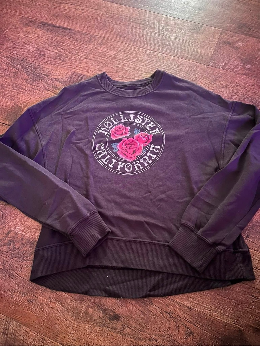 Hollister Black Crewneck Sweatshirt with Pink Rose Emblem